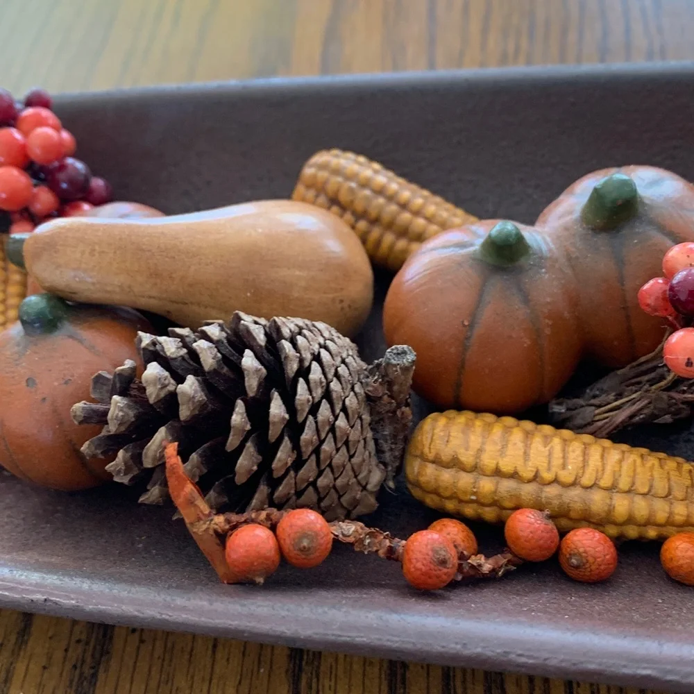 Fall-Themed Decorative Centerpiece in a long shallow bowl.